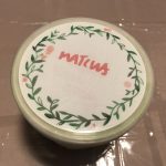 Ice cream lid with the word "Matcha"