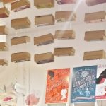 Books hanging from ceiling