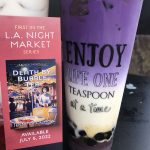 ube milk tea drink with boba and customized bookmark for Death By Bubble Tea by Jennifer J. Chow